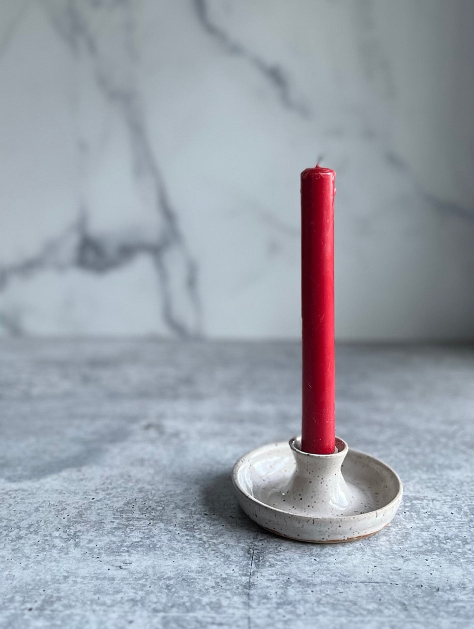 white-candle-stick-holder