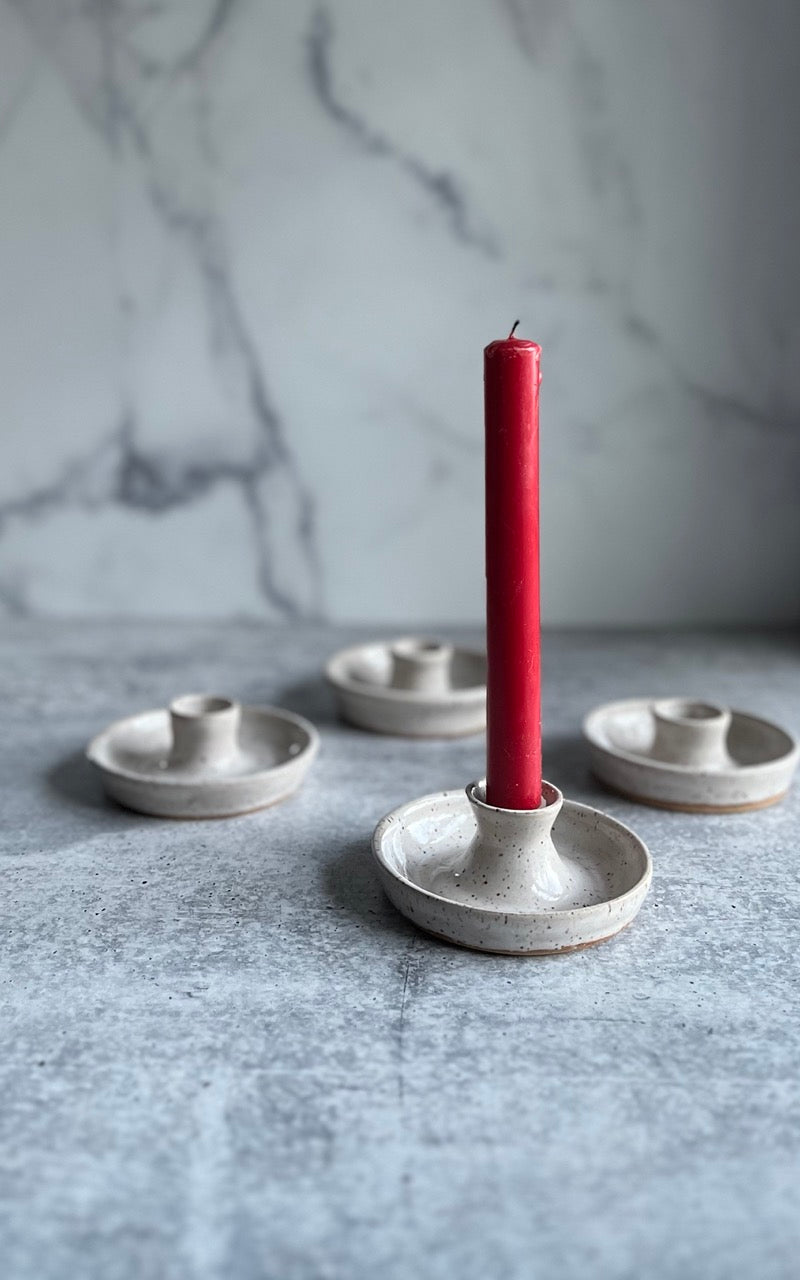 white-candle-stick-holder