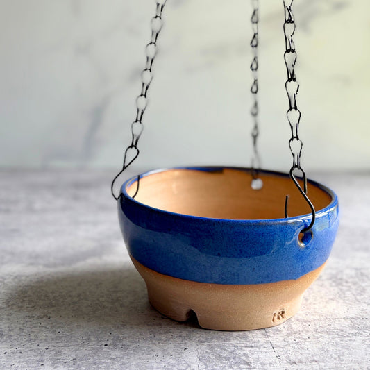 Handmade deep Bbue stoneware hanging planter with removable chain, wheel-thrown in Ethelsville Alabama