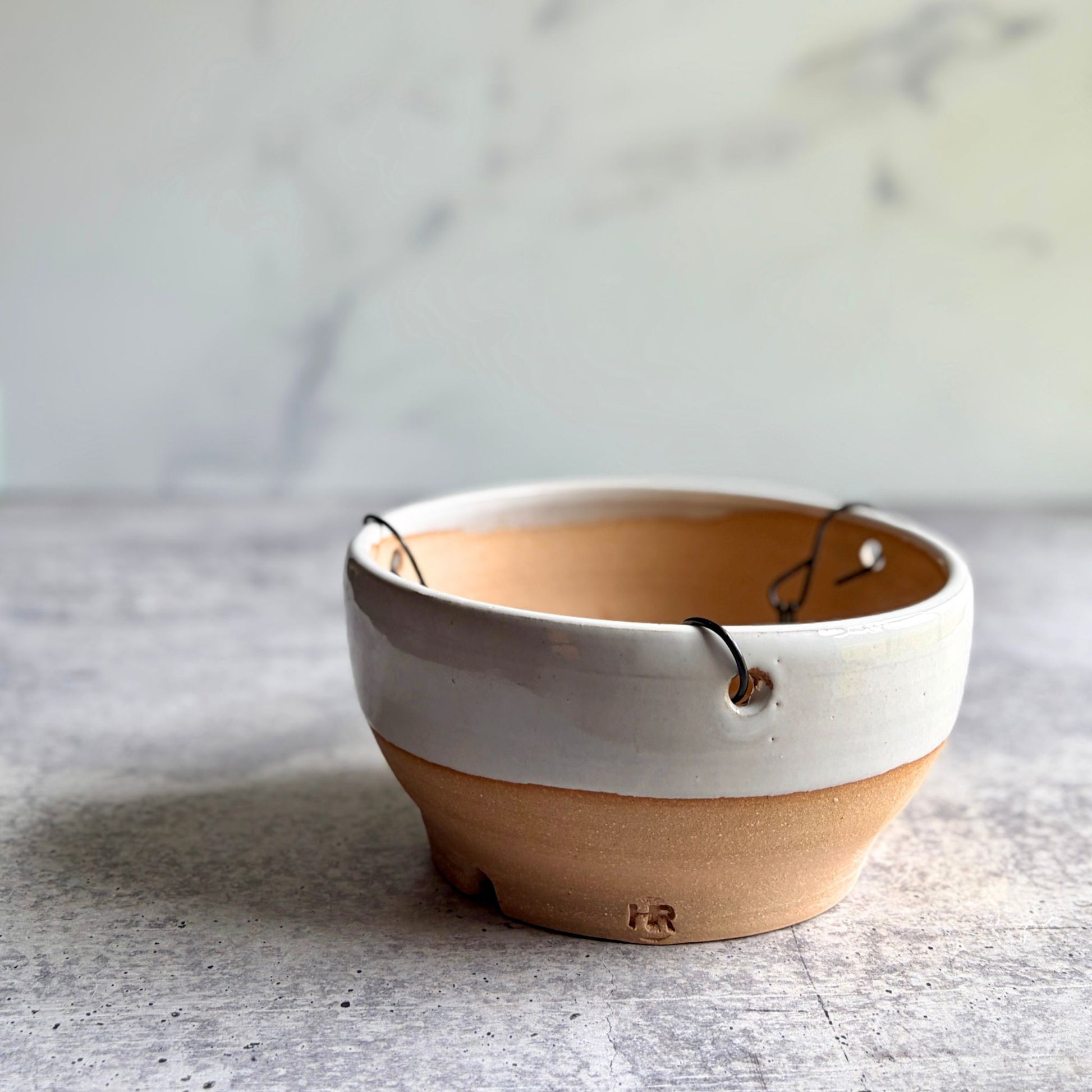 Handmade white stoneware hanging planter with removable chain, wheel-thrown in Ethelsville Alabama